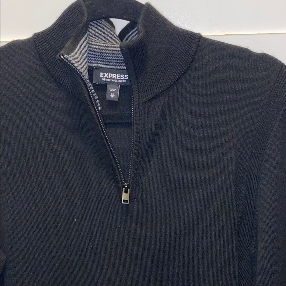 Black merino wool blend sweater.